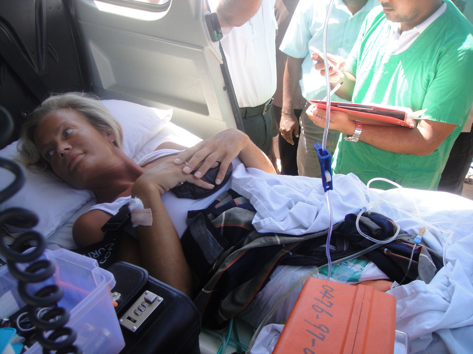 Clinician caring for a patient during a medical transport